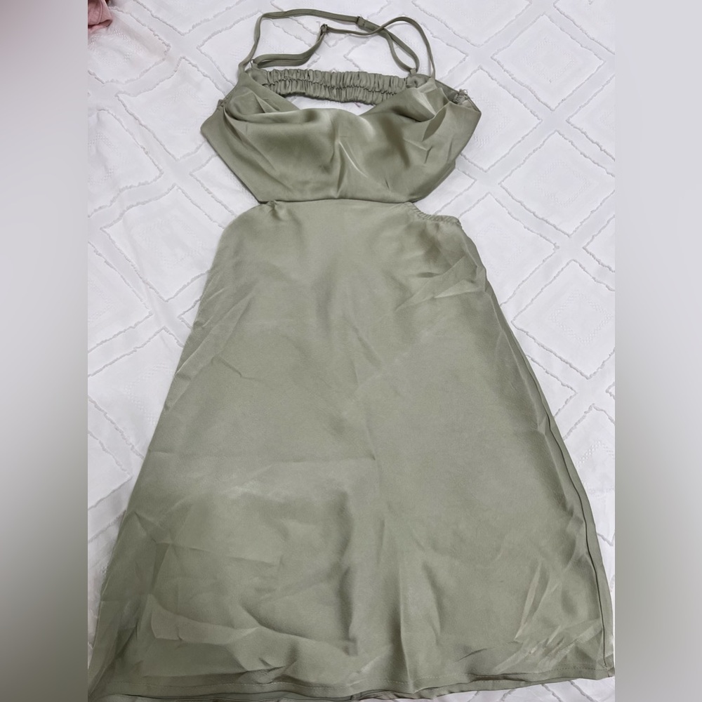 Green open back dress
